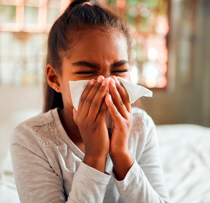 Child with allergies at home